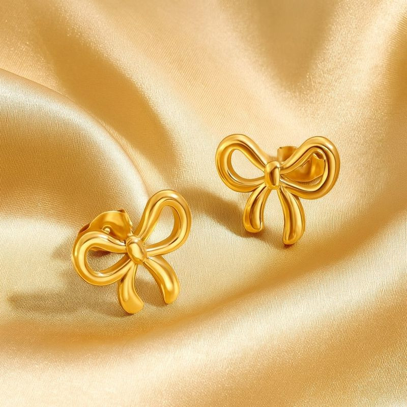 Серьги-гвоздики бантики медь напыление золотом 1J12406CJJ