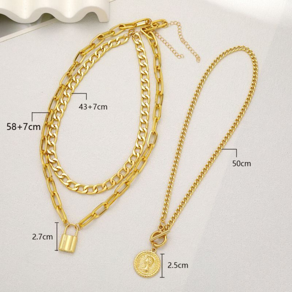 Тройное массивное колье из золотистых цепей с монетой и замком CJH65258