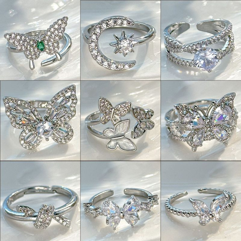 Серебристое кольцо с цветком и сердцем из циркона CJX86085