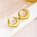 Золотистые геометрические серьги-кольца CJH63048