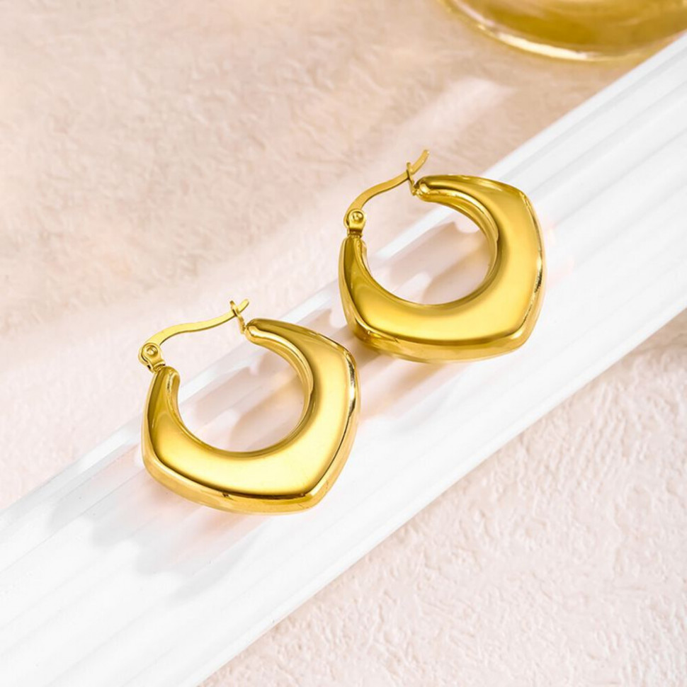 Золотистые геометрические серьги-кольца CJH63048