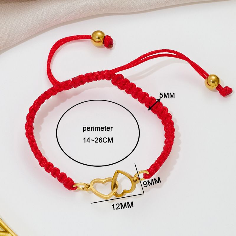 Браслет плетеная нить с двумя золотистыми сердцами CJQ65925