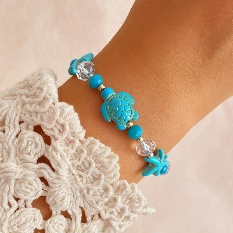 Браслет из голубых камней с черепахой CJP43689